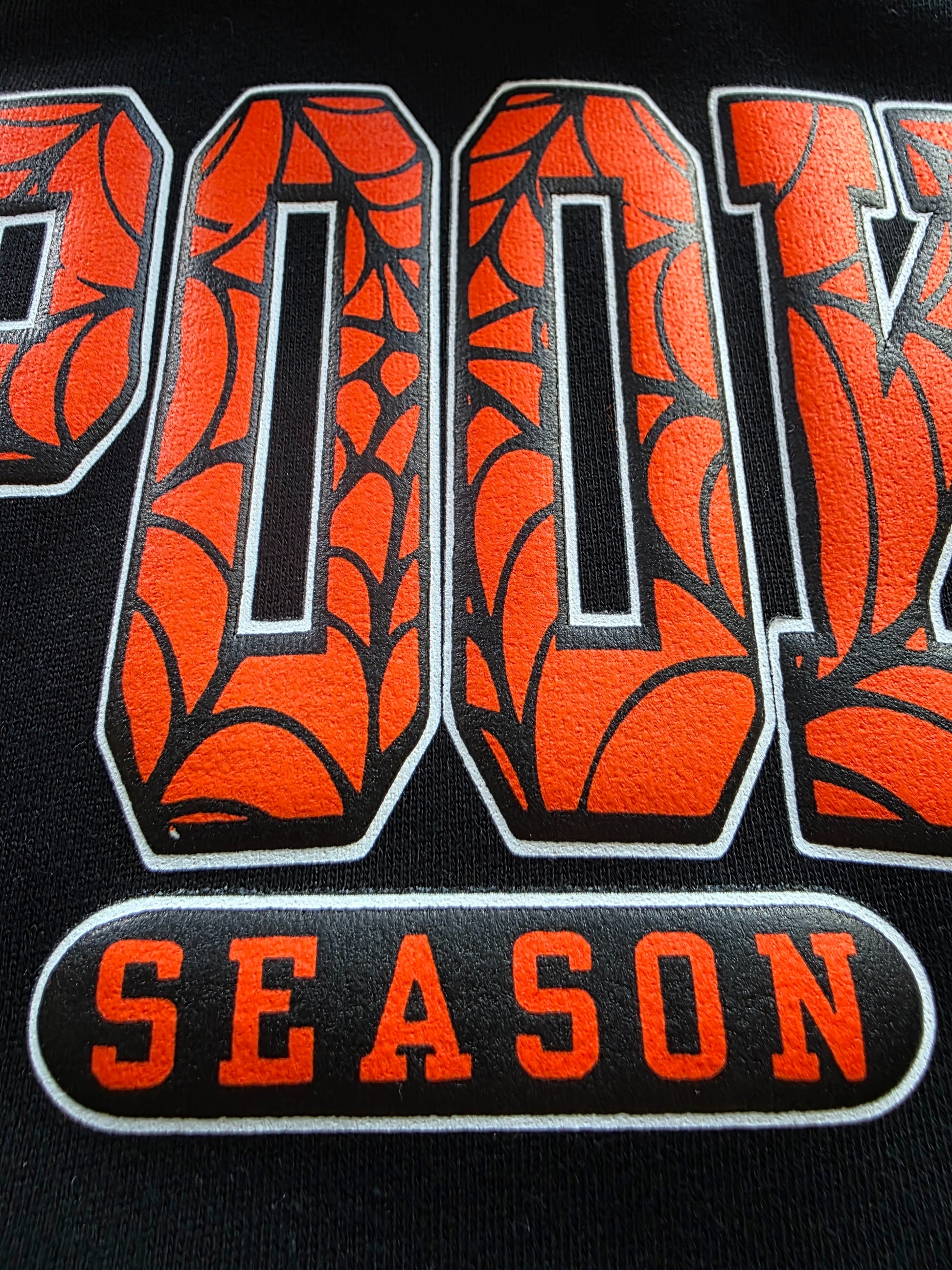 Basketball with 'POD SEASON' text on a black background