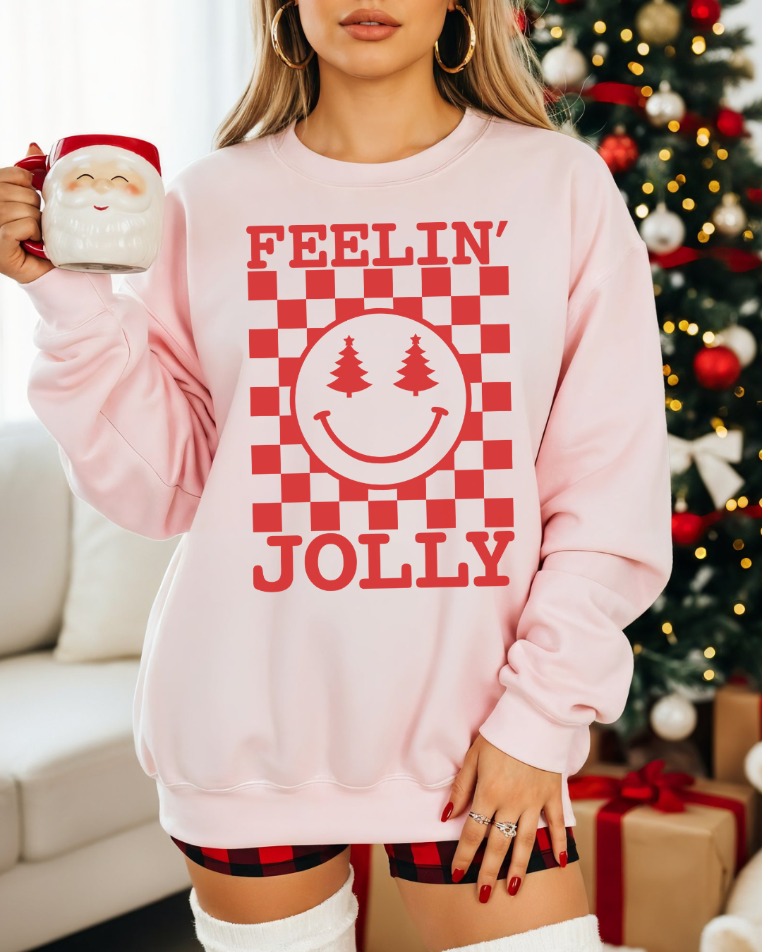 Feelin’ Jolly Checkered Smiley Christmas Sweatshirt | Holiday Crewneck with Tree Eyes | Pink, White, Ash & Sand