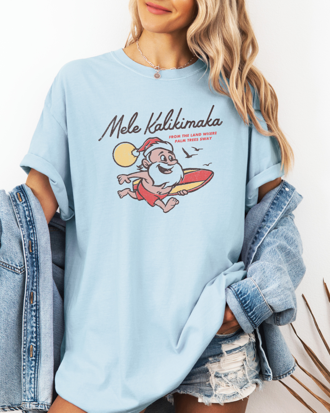 Mele Kalikimaka Santa Surfboard Tee – Tropical Christmas Shirt | Comfort Colors
