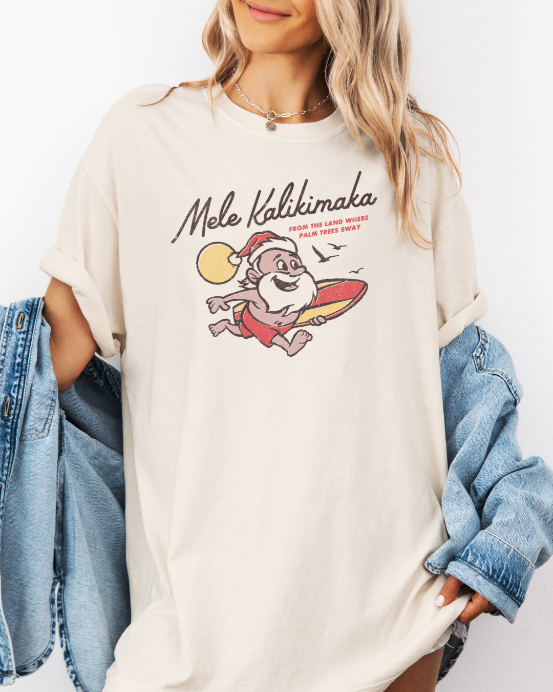 Mele Kalikimaka Santa Surfboard Tee – Tropical Christmas Shirt | Comfort Colors